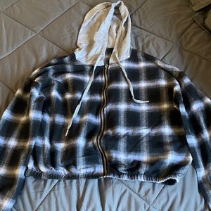 Grey and black checkered sweater